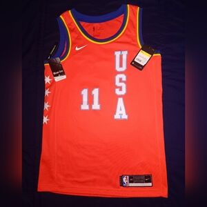 Trae Young #11 Nike Orange 2020 NBA Rising Stars Game Swingman Player Jersey.